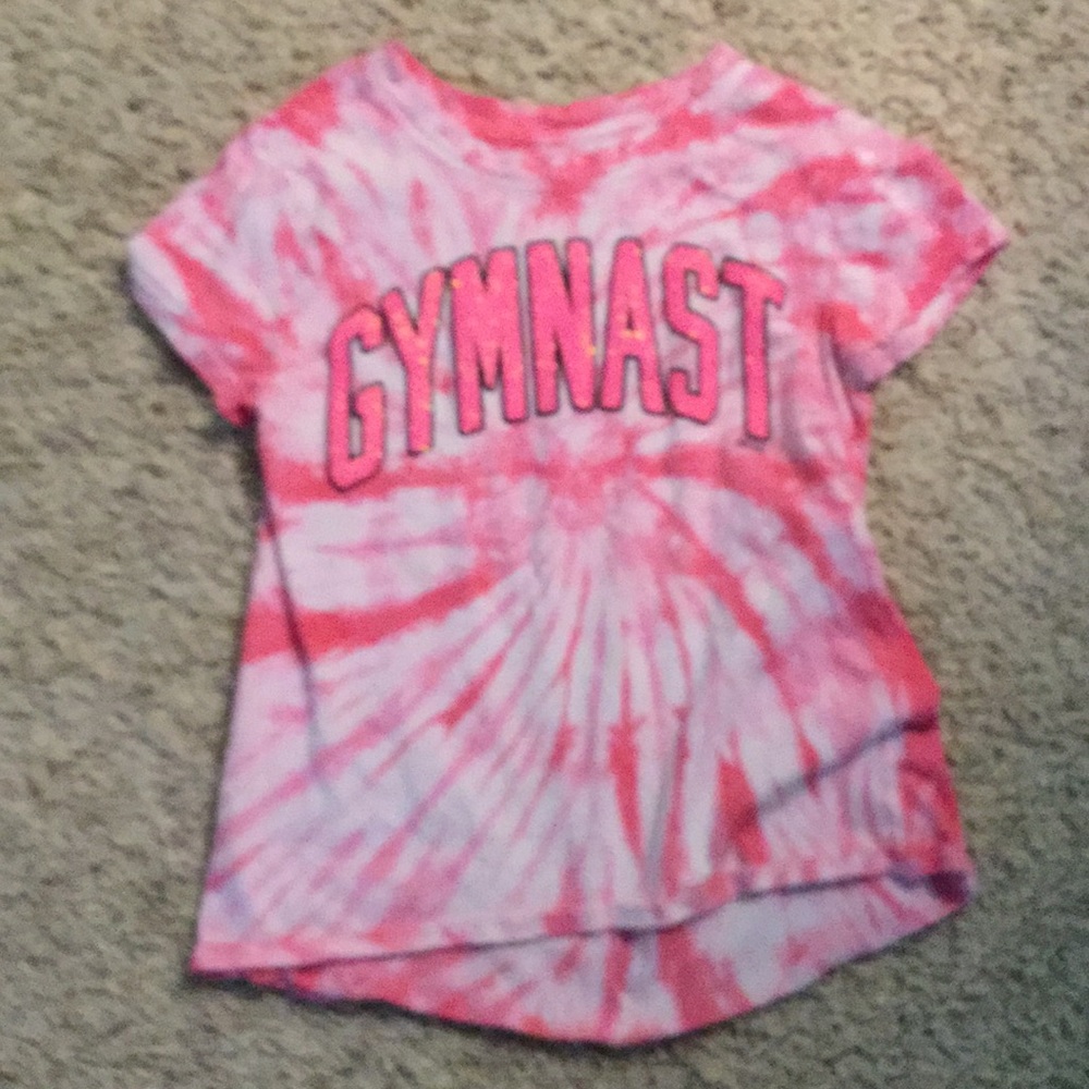 A neon pink T-shirt and matching shorts